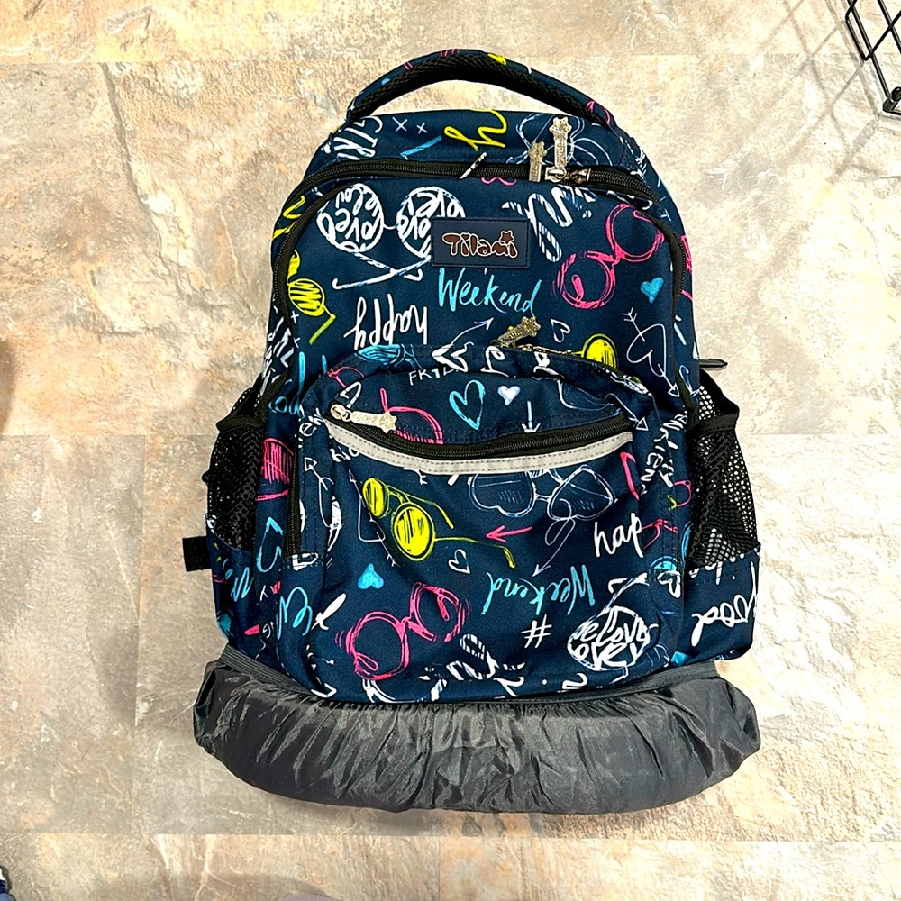 Tilami wheeled backpack approximately 18” in height